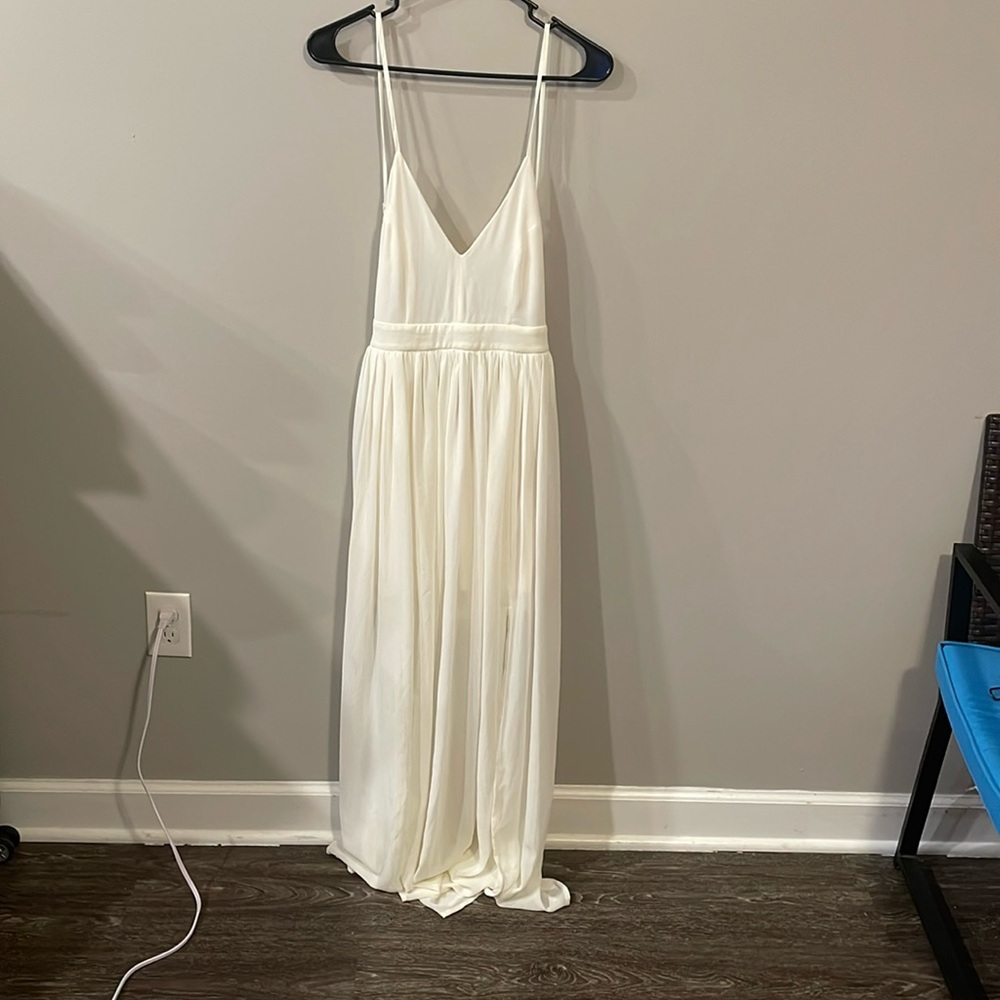 Off-white Maxi dress with side splits and undershorts.